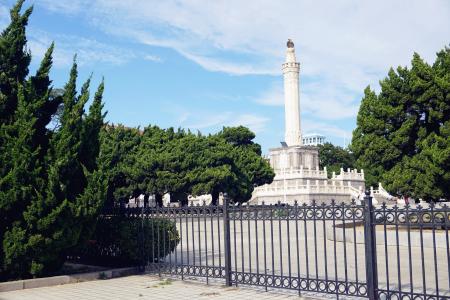 White Tower Under Blue and White Sky