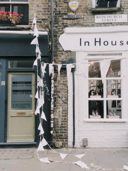 White Wooden in House Sign