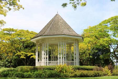 White Wooden Shed in the Middle of the Park during Day Time