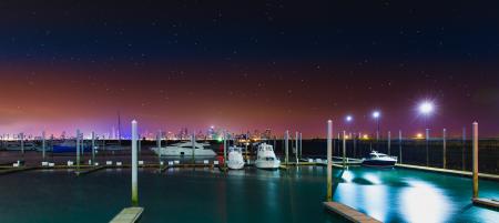 White Yacht at the Dock during Nighttime