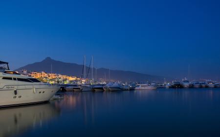 White Yacht on Body of Water during Nighttime