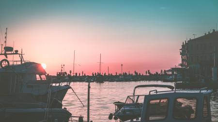 White Yacht on Body of Water during Sunset