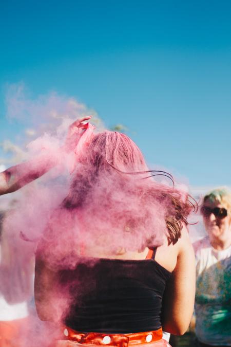 Woman Hair Covered With Pink Powder