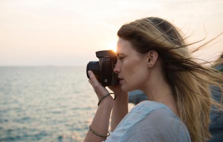 Woman Holding Black Dslr Camera