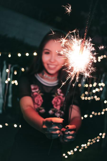 Woman Holding Firecrackers