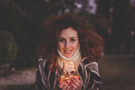 Woman Holding Glass Jar Lantern
