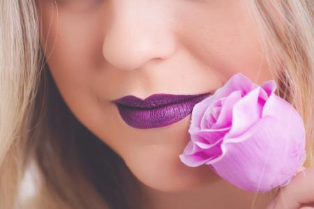 Woman Holding Pink Rose Flower