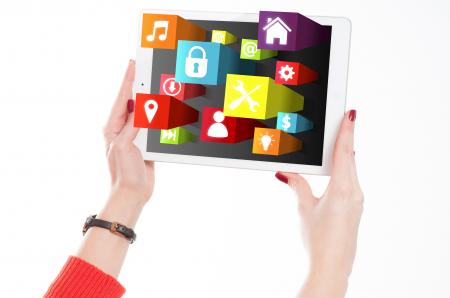 Woman Holding Tablet with App Icons