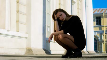 Woman in Black Bodycon Dress Taking a Pose