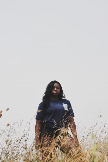 Woman in Black Top Posing