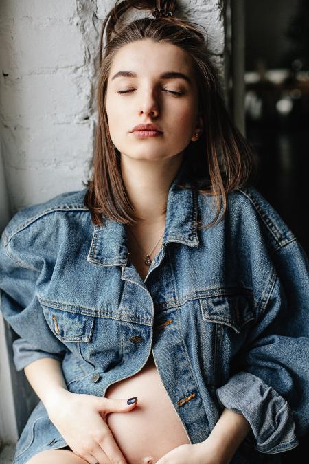 Woman in Blue Denim Button-up Jacket