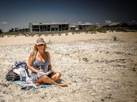 Woman In Blue Dress At The Beach