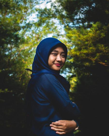 Woman In Blue Hijab And Abaya Traditional Dress