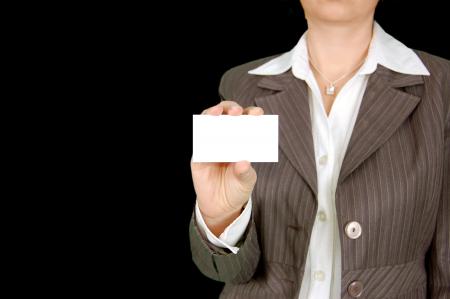Woman in Brown Stripe Blazer Holding White Card
