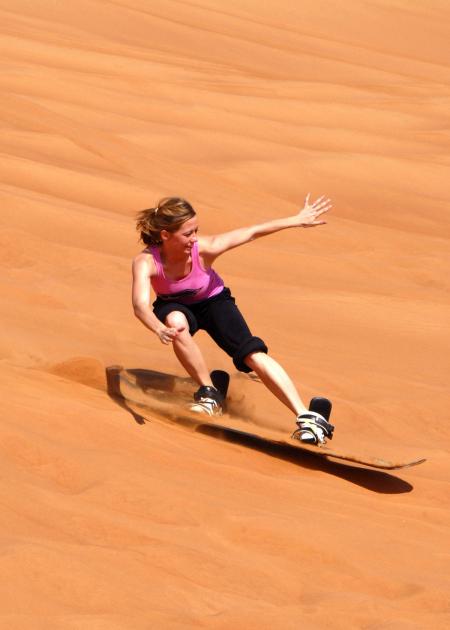 Woman in Doing Sun Boarding during Daytime