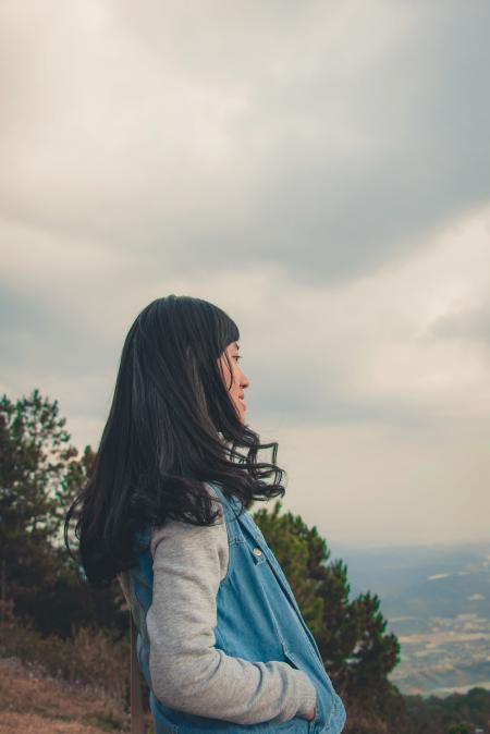 Woman in Gray and Blue Jacket