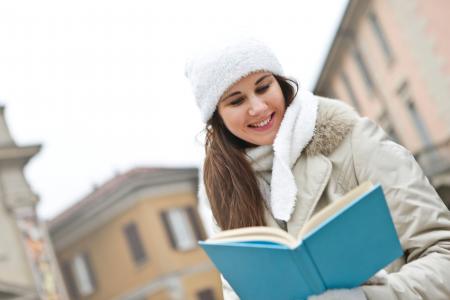 Woman in Gray Coat and White Cap