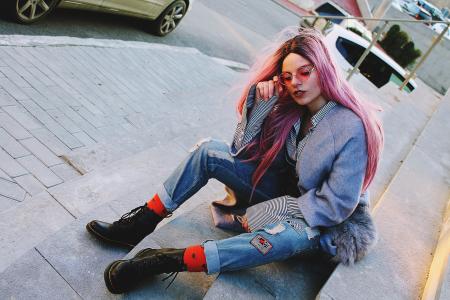 Woman in Gray Jacket and Lbue Jeans