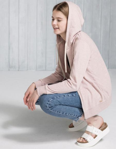 Woman In Pink Sweatshirt Siting On White