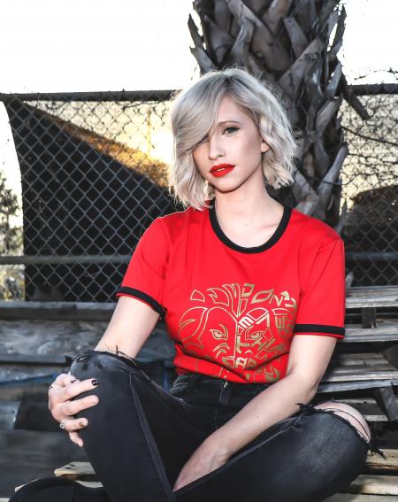 Woman in Red Crew-neck Shirt Sitting in Bench