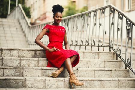 Woman in Red Off-shoulder Dress With Brown Leather High Heeled Gladiator Sandals on Brown Stairs