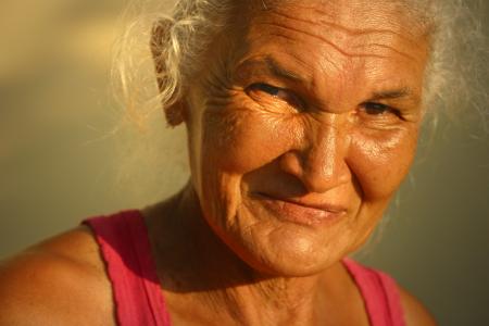 Woman In Red Tank Top Smiling