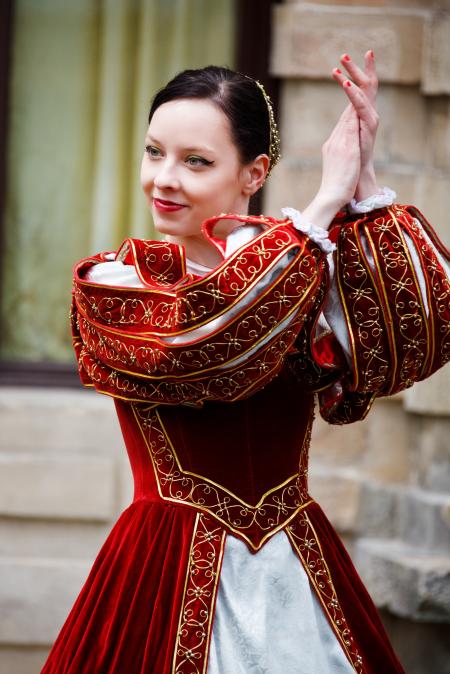 Woman in Red White Dress Clapping in Daytime