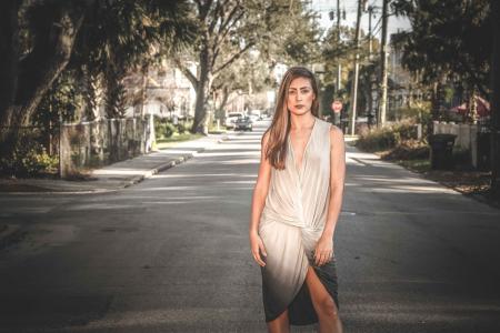 Woman in White and Black Sleeveless Dress