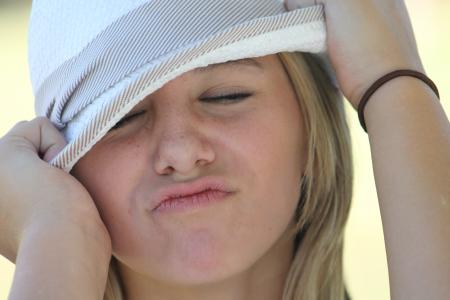 Woman in White and Grey Fedora Hat