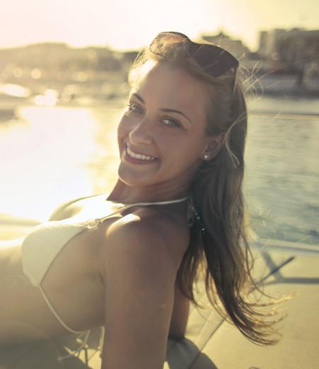 Woman In White Bikini Top