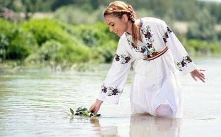 Woman in White Dress in the Water at Daytime