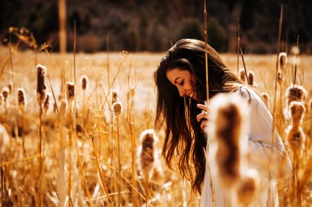 Woman in White Long-sleeved Shirt Walking on Brown Wheat Field