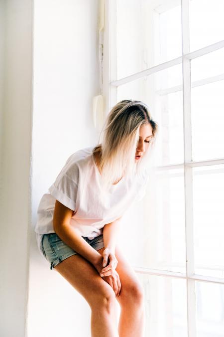 Woman in White Room