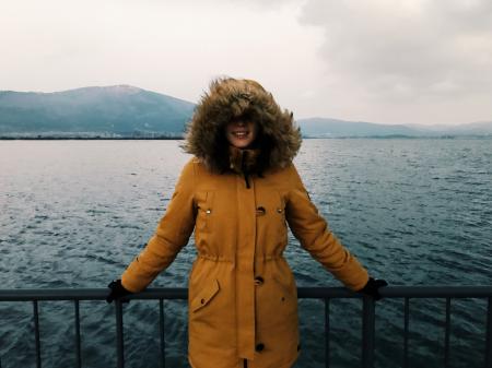 Woman in Yellow Winter Jacket