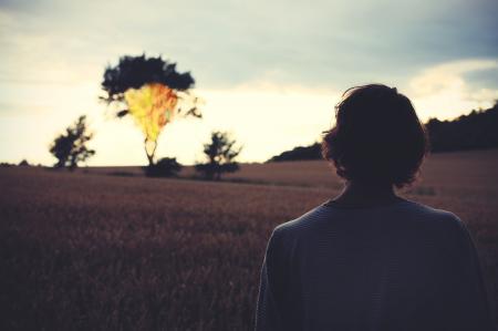 Woman Looking at Sunset