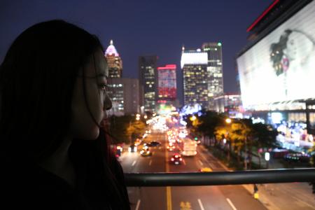 Woman Looking Down The Street