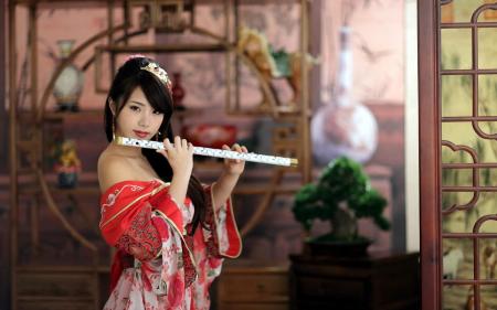 Woman Playing Flute