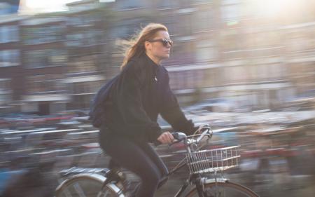 Woman Riding Bicycle