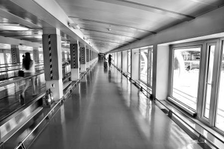 Woman Running on Hallway