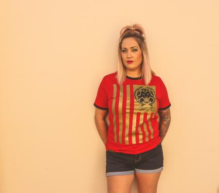 Woman Standing and Leaning on White Painted Wall