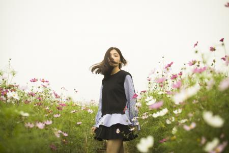 Woman Standing in the Flower Field