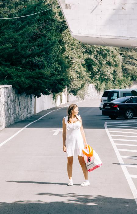 Woman Standing in the middle of the Road