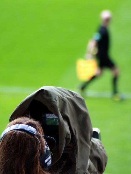 Woman Taking Picture on Man