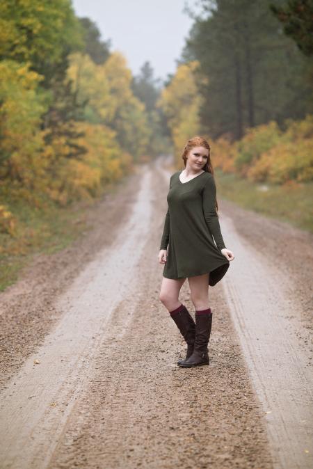 Woman Walking in Forest