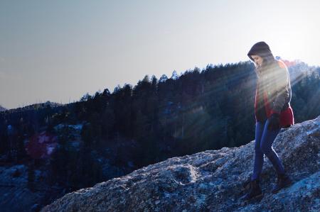 Woman Walking On Mountain