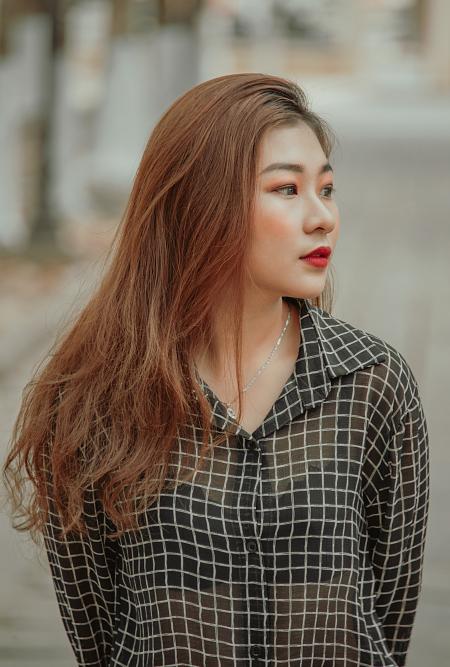 Woman Wearing Black and White Checkered Dress Shirt