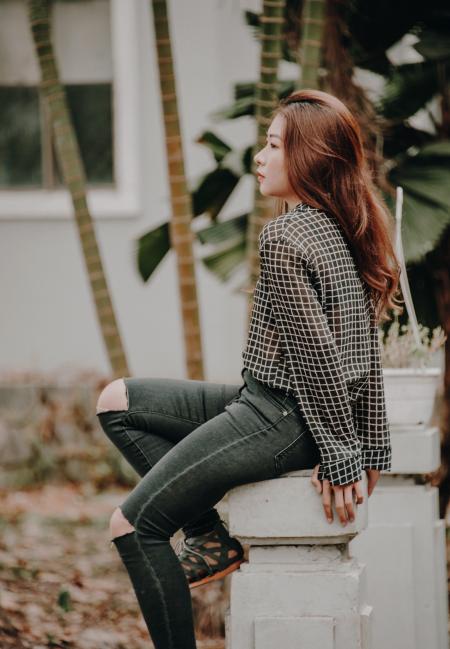 Woman Wearing Black and White Grid Chiffon Dress Shirt