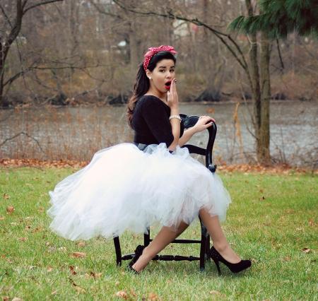 Woman Wearing Black And White Long Sleeve Dress