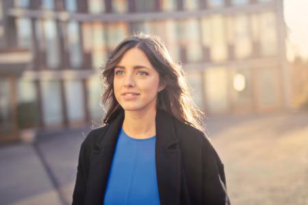 Woman Wearing Black Coat Standing