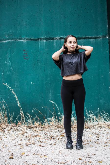 Woman Wearing Black Crew-neck Crop-top and Black High-waist Fitted Leggings